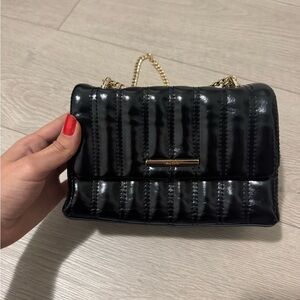 Aldo Black Glossy Crossbody Bag with Gold Chain